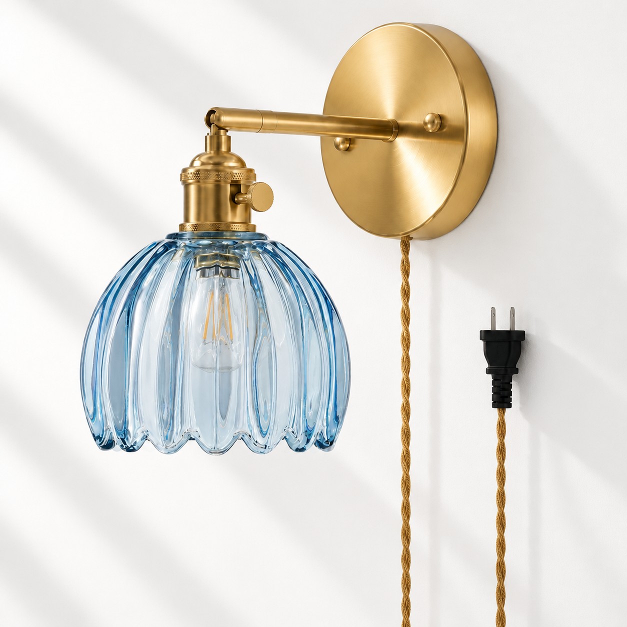 Blue tulip glass plug-in wall sconce