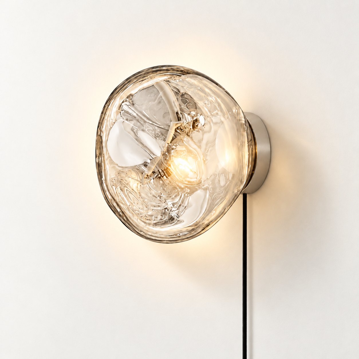 Silver plug-in wall light, shade on